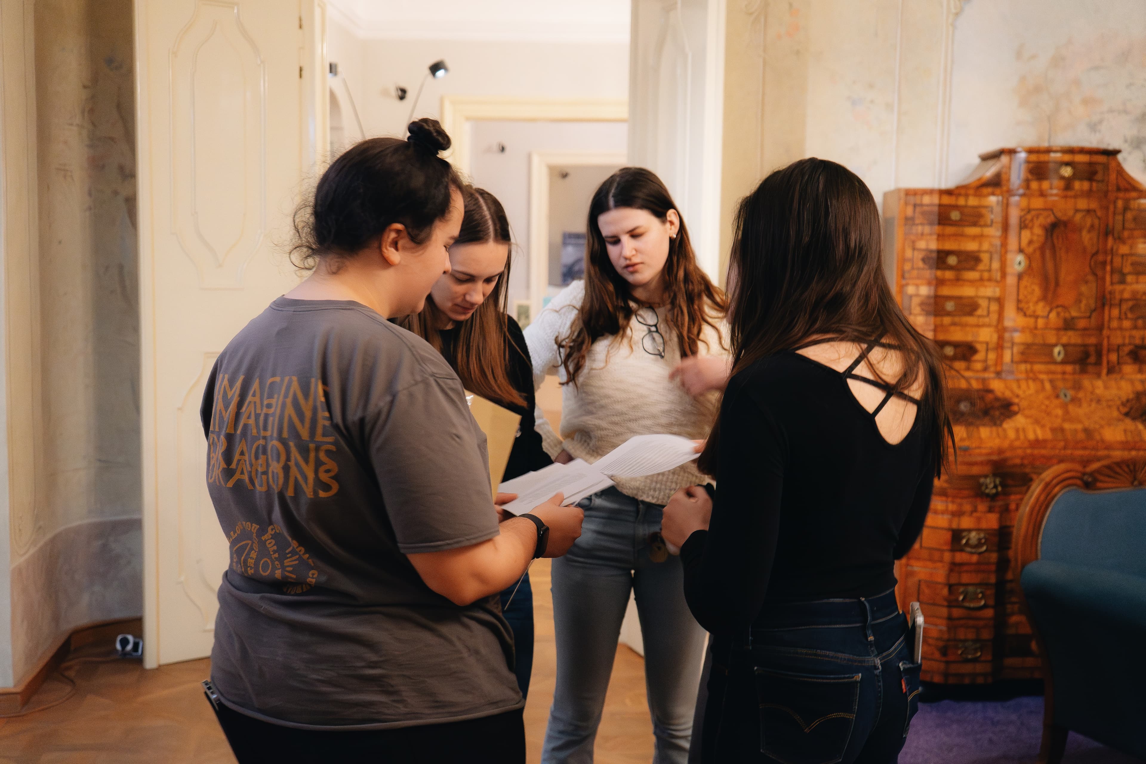 View of young people taking part in a creative activity at Bratislava City Museum